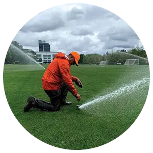 Groundskeeper lining field